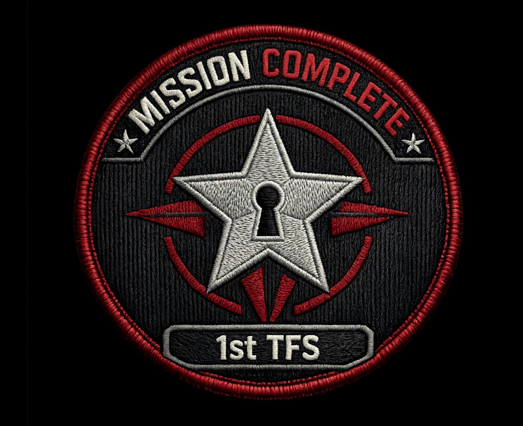 Black, red and silver Mission Complete 1st TFS patch with a compass star and keyhole